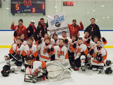 The McKnight Mustangs - the Pee Wee 12 champions in the 2015 Esso Minor Hockey Week.