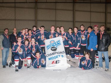 The Northwest Warriors Midget 5 champions in the 2015 Esso Minor Hockey Week.