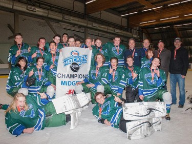 The Hawks Midget 6 champions in the 2015 Esso Minor Hockey Week.