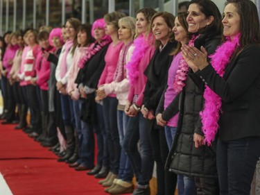 The moms line up on the red carpet to receive the pink jerseys from their sons after the Northwest Calgary Athletic Associationís 5th annual ìPink in the Rinkî fundraiser in Calgary, on January 17, 2015.