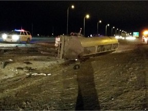 RCMP are investigating after a tanker trailer loaded with gasoline left Highway 2 and collided with the centre median near Cross Iron Drive on Tuesday, January 20, 2015. Photo courtesy Airdrie RCMP.