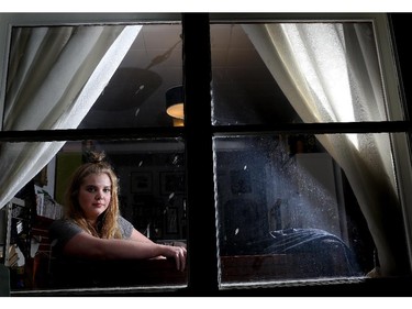 Local musician Samantha Savage Smith poses for a portrait at her home in Calgary, Alberta on January 19, 2015.