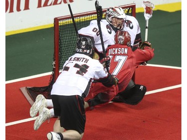 The Roughnecks Jeff Shattler can't be stopped as he scores from this diving shot at Vancouver Stealth's goalie Tyler Richards during the Roughnecks home opener in Calgary, on January 3, 2015. The Roughnecks couldn't pull it together eventually succumbing to the Stealth 18 to 14.