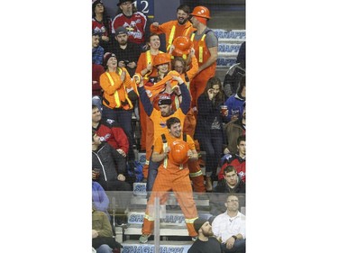 Fans dance between whistles at the Roughnecks home opener against the Vancouver Stealth in Calgary, on January 3, 2015. The Roughnecks couldn't pull it together eventually succumbing to the Stealth 18 to 14.