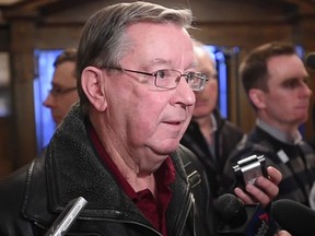 Bruce Rowe speaks to the media on Wednesday, Jan. 28, after a Tory caucus meeting.