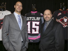 Ryan Getzlaf, left, former Calgary Hitmen and current NHL superstar with the Anaheim Ducks, poses for a photo with Scott Lorencz, who was Getzlaf's billet when he played for the Hitmen from 2001 to 2005.
