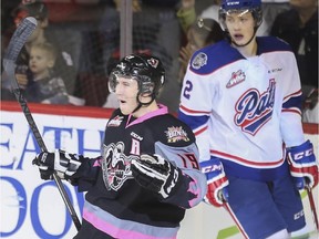 Calgary Hitmen star Adam Tambellini celebrates his third goal of the game as the Hitmen went on to a 5-2 win over the Regina Pats on Sunday.