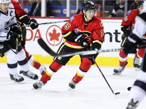 The Calgary Flames' Johnny Gaudreau moves through traffic during NHL action against the Los Angeles Kings in Calgary.