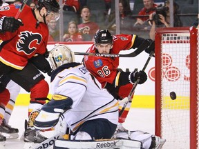 Calgary Flames forward Josh Jooris watches his shot head past Buffalo Sabres goalie Jhonas Enroth in the third period on Tuesday. Calgary won 4-1.