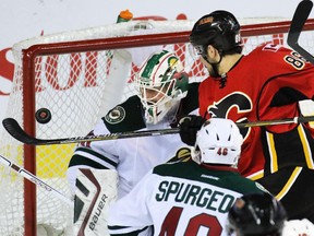 Calgary Flames forward Josh Jooris couldn't quite get this shot past Minnesota Wild goaltender Devan Dubnyk during the first period on Thursday. Dubnyk, who grew up in Calgary, made 30 saves for a 1-0 shut out over the Flames.