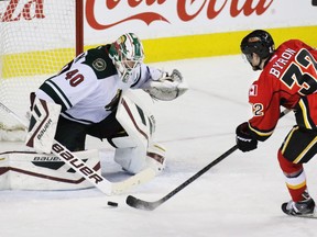 Calgary Flames forward Paul Byron was denied by Minnesota Wild goaltender Devan Dubnyk during this breakaway in front in the third period of NHL action at the Scotiabank Saddledome on Thursday Jan. 29, 2015. The Wild won the game 1-0.