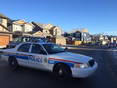 Calgary Police have blocked roads in Auburn Bay where they are investigating a shooting.