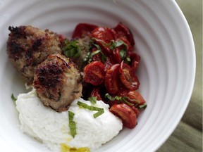 Baked Turkey Meatballs and Slow-Roasted Tomatoes: an easy supper all cooked on sheet pans. The recipe is from Molly Gilbert's new cookbook, Sheet Pan Suppers.