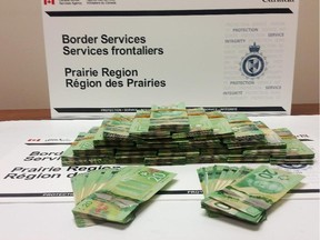 The Canada Border Services Agency seized $38,060 as suspected proceeds of crime from an outbound traveller at the Calgary International Airport on January 15, 2015.