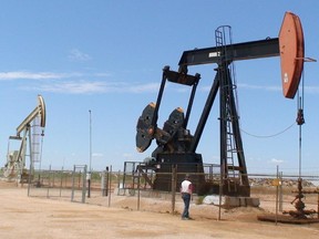 This file photo shows oil drilling rigs in Midland County, Texas.