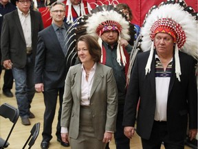 Alison Redford, who was premier at the time, is seen with Tsuu Tina band members at the historic signing of the ring road agreement in 2013.