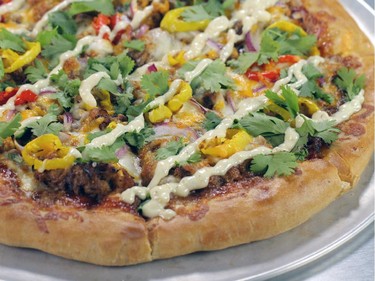 The Pulled Pork Pizza from Two Guys and a Pizza Place is one of the dishes that will appear on You Gotta Eat Here.