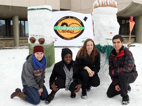 In less than an hour Kacie Mcleod, Sarah Sanni, Kristen Murray and Milan Todorovic put together their Survivor themed sculptures as engineering students were digging and packing snow into giant and colourful sculptures as part of their Engineering Week final events.