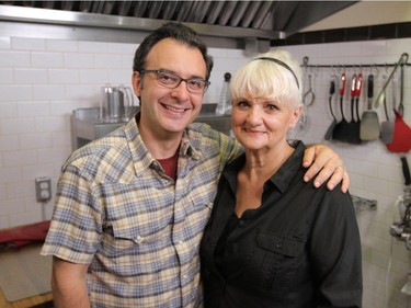 Chef Lynne Norem of Priddis View  &  Brew poses with You Gotta Eat Here host John Catucci. The Priddis restaurant is featured on the new season of the Food Network Canada show.