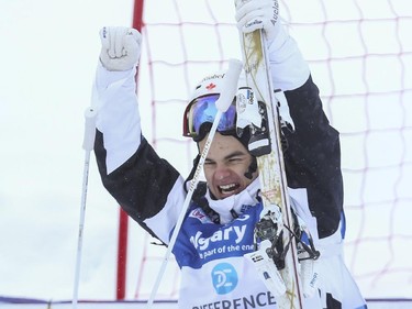 Mikael Kingsbury celebrates his first place finish at the men's Freestyle moguls skiing 2015 World Cup at Canada Olympic Park in Calgary, on January 3, 2015.