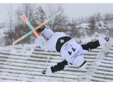 Simon Pouliot-Cavanagh of Canada competes for a second place finish at the Freestyle moguls skiing 2015 World Cup at Canada Olympic Park in Calgary, on January 3, 2015.