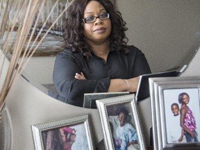 Charmaine Francis, a user and advocate of Families and Schools Together (FAST), a program that is at risk of reduced government funding due to provincial budget cuts, is photographed in her home in Calgary, on February 13, 2015.