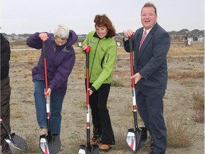 Airdrie Mayor Peter Brown, right, at a sod-turning ceremony.