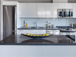 Kitchens in condos, such as this one by Lamb Development Corp., take sleekness to a new level.