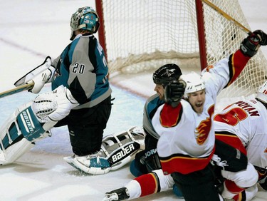 Calgary Flames Steve Montador celebrates after scoring the winning goal in the first overtime on San Jose Sharks goaltender Evgeni Nabokov for a 4-3 victory in game one of the NHL Western Conference final in San Jose Sunday May 9, 2004.