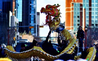 Members of the Jing Wo Lion Dance Team perform during Chinese New Year celebrations at the Chinese Cultural Centre on February 15, 2015.