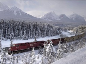 A Canadian Pacific freight train travels around Morant's Curve near Baker Creek in Banff National Park on Monday December 1, 2014.