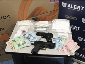 ALERT Lethbridge executed two search warrants at a south Lethbridge apartment building on February 20, 2015, as part of a drug trafficking investigation, and seized $25,000 worth of drugs, a handgun, several replica handguns, and stolen property.