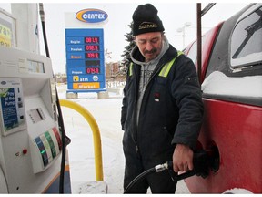 Rob Baker filled his truck with gas at the Centex station in Inglewood on January 5, 2015 as gas prices continued to sit in the 80 cents per litre range.