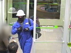A surveillance camera image of a man who robbed the TD Canada Trust bank at 3012 17th Avenue S.E. in 2009.