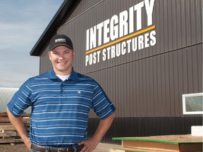 Jerry Myer, co-founder and partner of Integrity Post Structures, outside the head office and manufacturing plant he built in Okotoks.