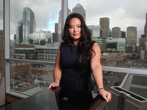 Realtor Christina Hagerty in one of her listings, a unit overlooking downtown, in the Colours building in Victoria Park, Friday February 20, 2015.