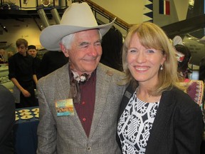 Cal 0214 Tourism 3 Pictured with Tourism Calgary CEO Cindy Ady at Tourism Calgary's annual open house- held this year Jan 29 at The Military  Museums is The Home Place Ranch's Mac Makenny.