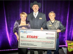 Pictured at the Petroleum Services Association of Canada (PSAC) presented STARS & Spurs Gala je;d Jan 24 in the BMO Centre are, from left,   Andrea Robertson, president and CEO, STARS, Mark Salkeld, president and CEO, PSAC; and, Wally Dumont, chair, gala organizing committee. More than 1100 guests attended the gala.