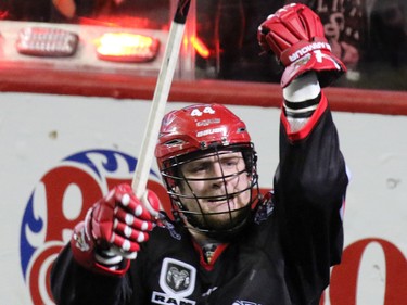 Calgary Roughneck Dane Dobbie celebrates scoring against the Buffalo Bandits in the forth quarter during National Lacrosse League action at the Scotiabank Saddledome on Saturday Feb. 7, 2015. The Roughnecks ended up loosing 15-14.