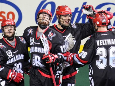 After being down early the Calgary Roughneck celebrate a go ahead goal against the Buffalo Bandits during National Lacrosse League action at the Scotiabank Saddledome on Saturday Feb. 7, 2015.