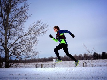 Ultra marathoner Dave Proctor goes for a run near his home Black Diamond on February 1, 2014.