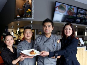Watercress express owner, Linh Trinh, left, chef David Lam and chef Lam Pham and owner Ngoc Vo, right.