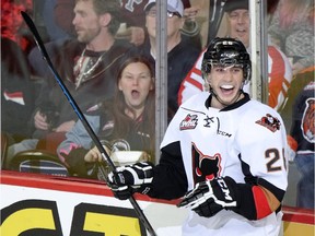 Calgary Hitmen veteran Connor Rankin celebrates after scoring on Medicine Hat Tigers netminder Nick Schneider on Tuesday at the Saddledome. With a 4-1 win, the Hitmen pulled to within four points of their rivals for the division lead and they have two games in hand.