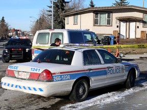Calgary city police investigate after a shooting in the 400 block of 26th Avenue N.E. on Sunday, February 22, 2015.