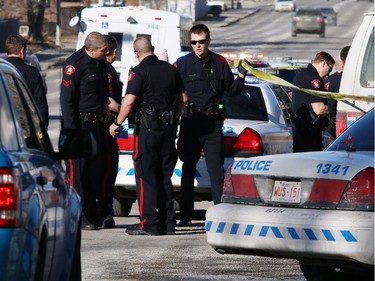 Calgary police investigate after a fatal shooting in the 400 block of 26th Avenue N.E. on Sunday, February 22, 2015.