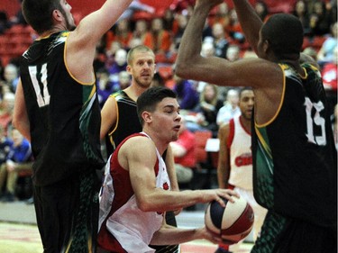 Tyler Fidler of the Crush is surrounded by Rumble players, as the Calgary Crush played host to  the San Francisco Rumble in American Basketball Association action on Sunday, February 22, 2015.