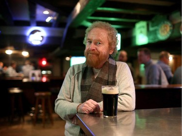 George Millar from the Irish Rovers poses in the Unicorn Pub which he and his bandmates opened decades ago in Calgary.