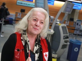 Calgary based Red Cross worker Val Heerema prepares to head out on a flight to Ottawa en route to a Ebola Treatment Centre in Sierra Leone. Heerema will be helping those affected by the outbreak.