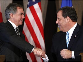 New Jersey Gov. Chris Christie, right, meets with Alberta Premier Jim Prentice in Calgary on  Dec. 4, 2014. The two politicians met again Thursday in Trenton, N.J.