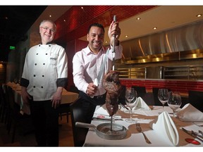 Oscar Lopez, owner and Joao Dachery, executive chef, show off AAA top sirloin at their restaurant Pampa, a Brazilian steakhouse, in Calgary